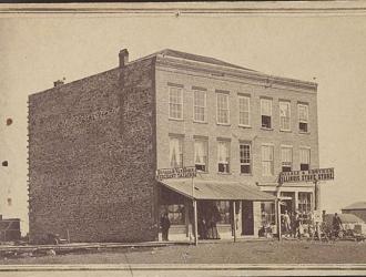 Photograph of the Gale block in Topeka, Kansas, where the Kansas state legislature convened in the 1860s.